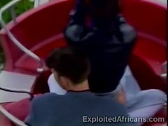 Dark African beauty gets pumped by white dick at ferris Wheel