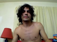 Skinny twinkie with shaggy hair masturbates his hairy dick