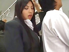 Sexy Asian hottie Saori Hara gropes a man on the subway and yanks his wanker