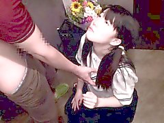 Japanese teen in schoolgirl uniform tittyfucked in hallway