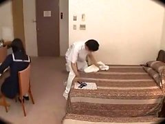 Sluty asian cheerleader in uniform giving blowjob in kitchen