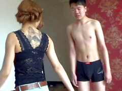 Chinese ballbusting, wrestling