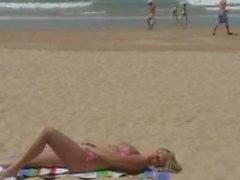 Alison Angel toying on the beach