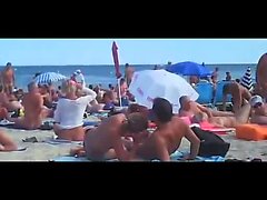 Playa nudista relojes una cogida pareja